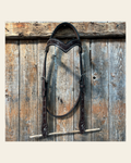 Floral V Browband Dark Oil Headstall / Bridle on a warm cream background