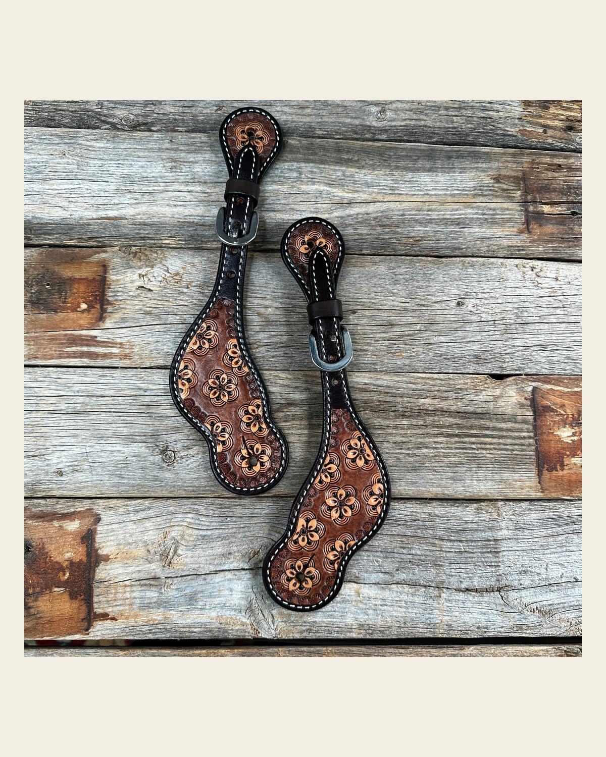 Flower Power Spur Straps on a warm cream background