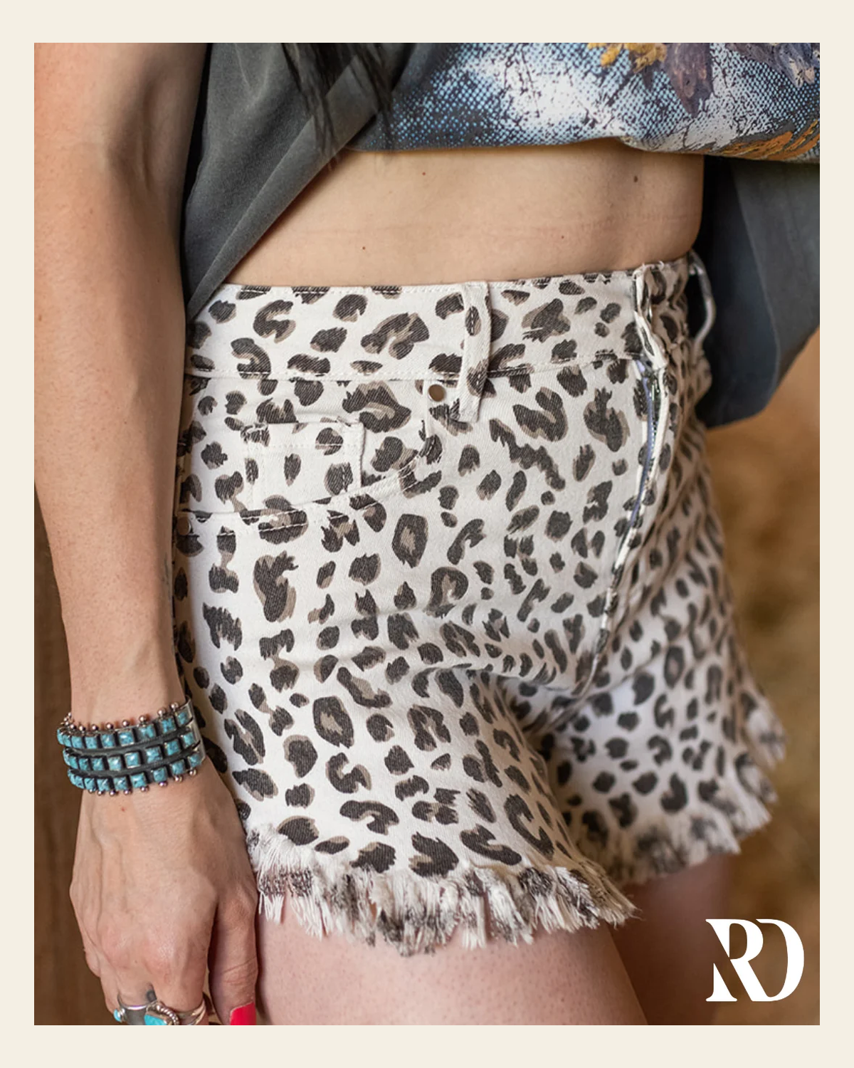 Frayed Leopard Denim | Shorts on a warm cream background