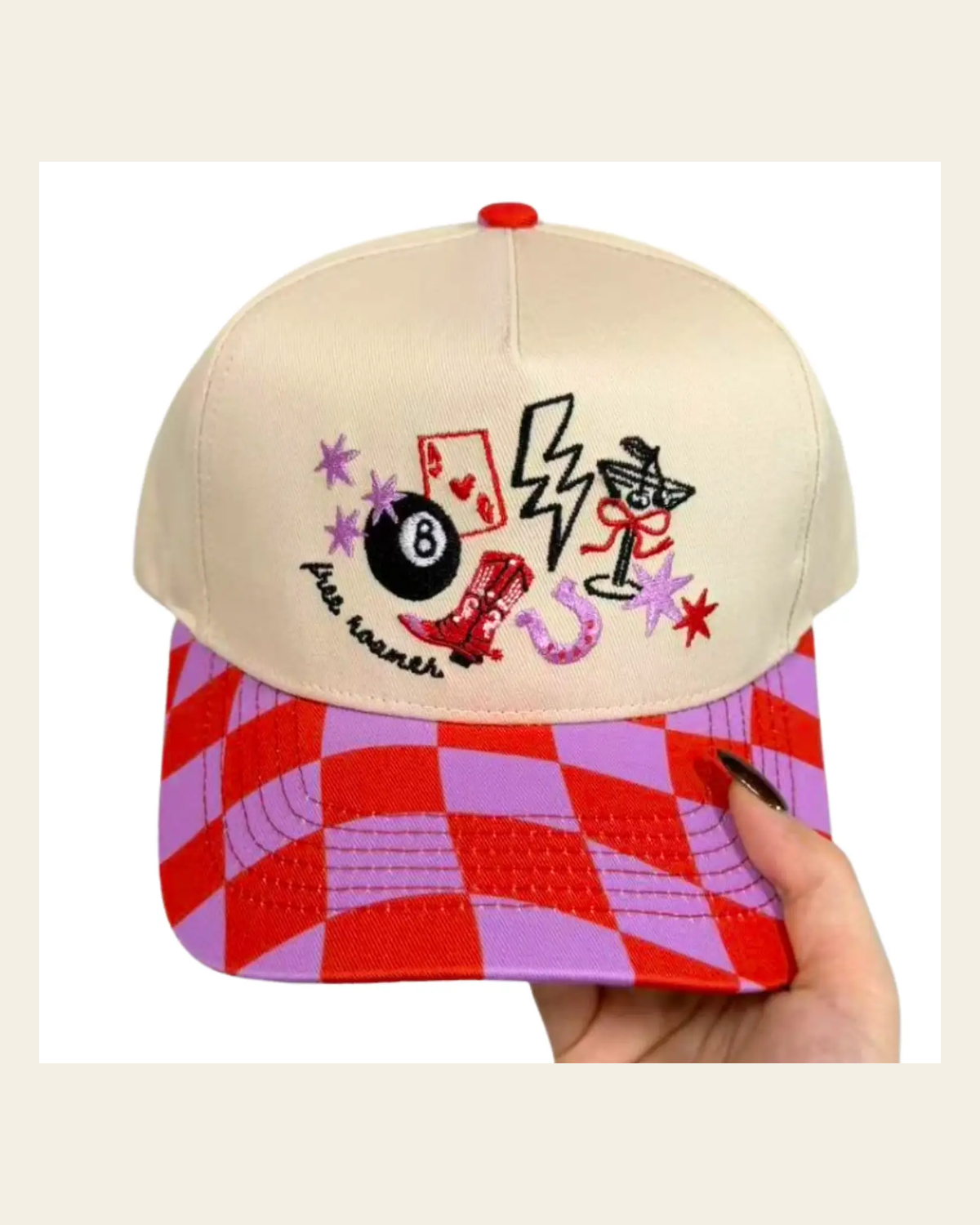 Free Roamer | Cap on a warm cream background