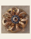 Gold Lotus Flower With Antique Silver Topaz and Champagne 1" Concho on a warm cream background