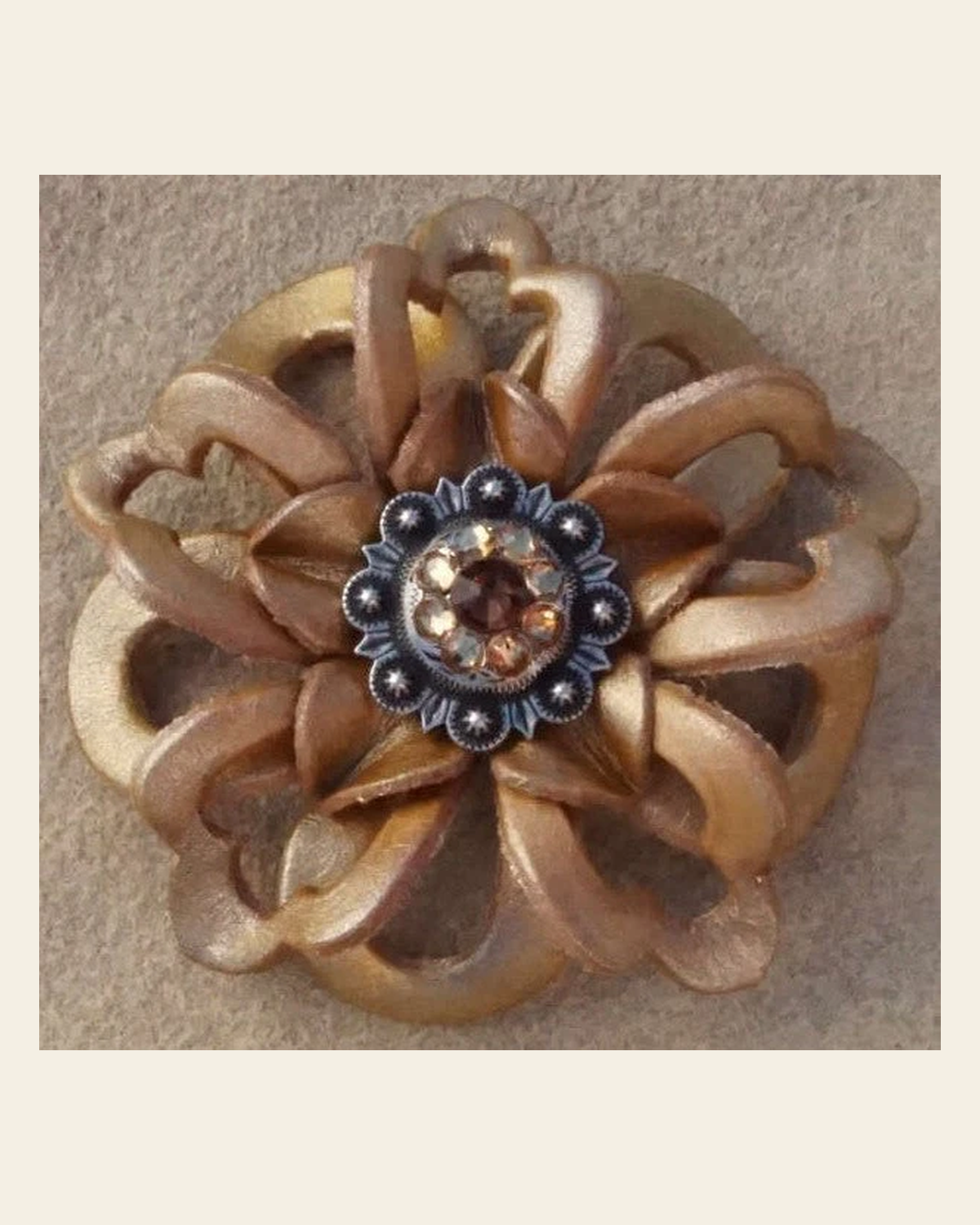 Gold Lotus Flower With Antique Silver Topaz and Champagne 1" Concho on a warm cream background