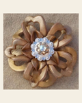 Gold Lotus Flower With Bright Silver Champagne and AB 1" Concho on a warm cream background