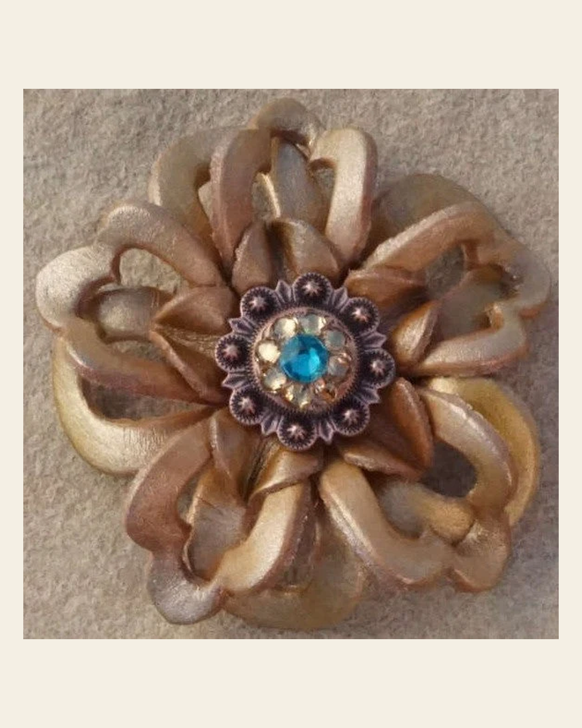 Gold Lotus Flower With Copper Teal and Champagne 1" Concho on a warm cream background