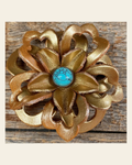 Gold Lotus Flower With Round Turquoise Cabochon on a warm cream background