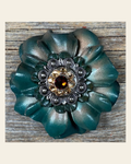 Green Carnation Flower With Antique Silver Topaz, Champagne 1" Concho on a warm cream background