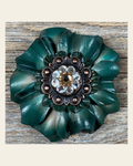 Green Carnation Flower With Copper Champagne, Clear 1" Concho on a warm cream background