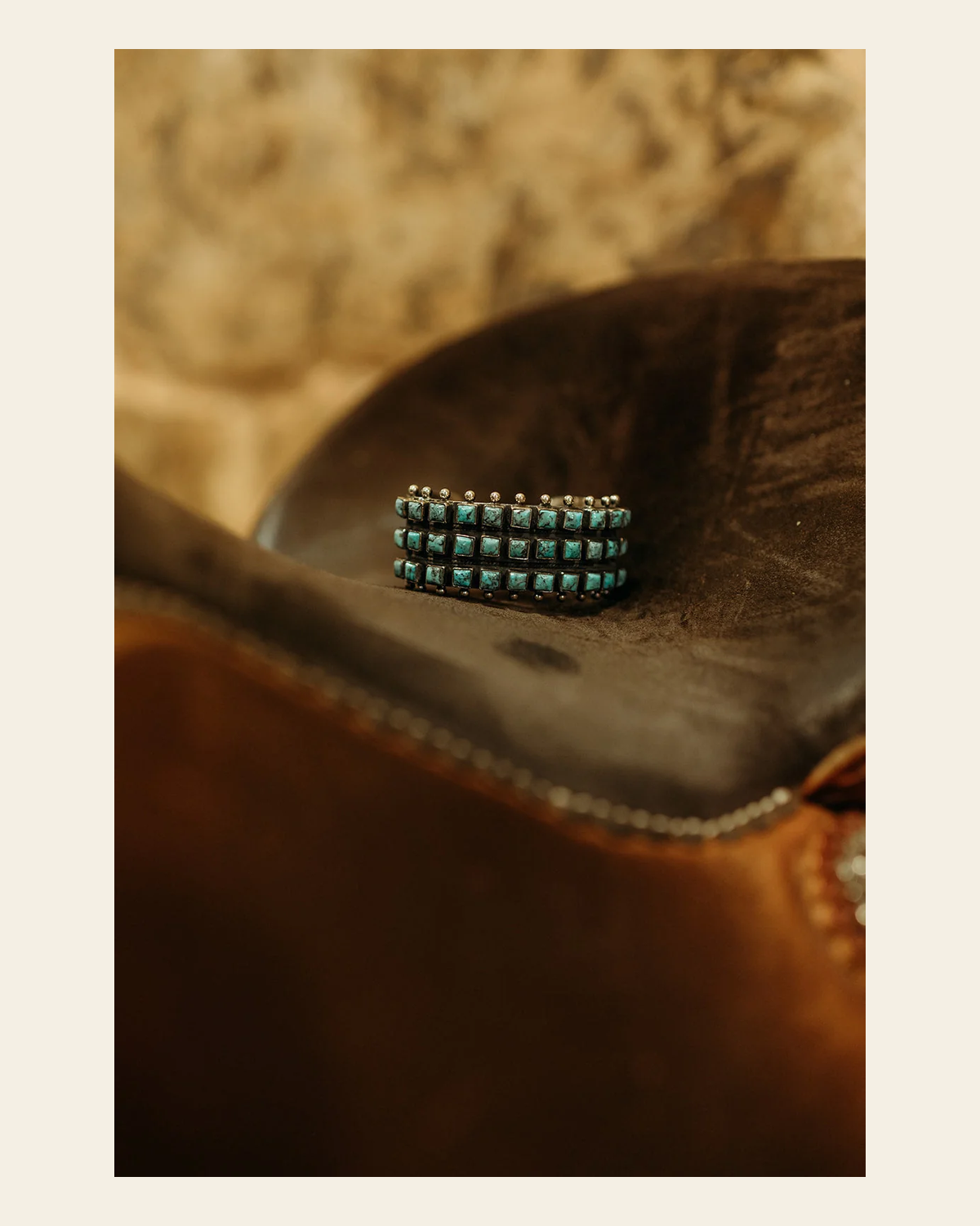Hada Collection - Three Row Square Authentic Turquoise Cuff on a warm cream background