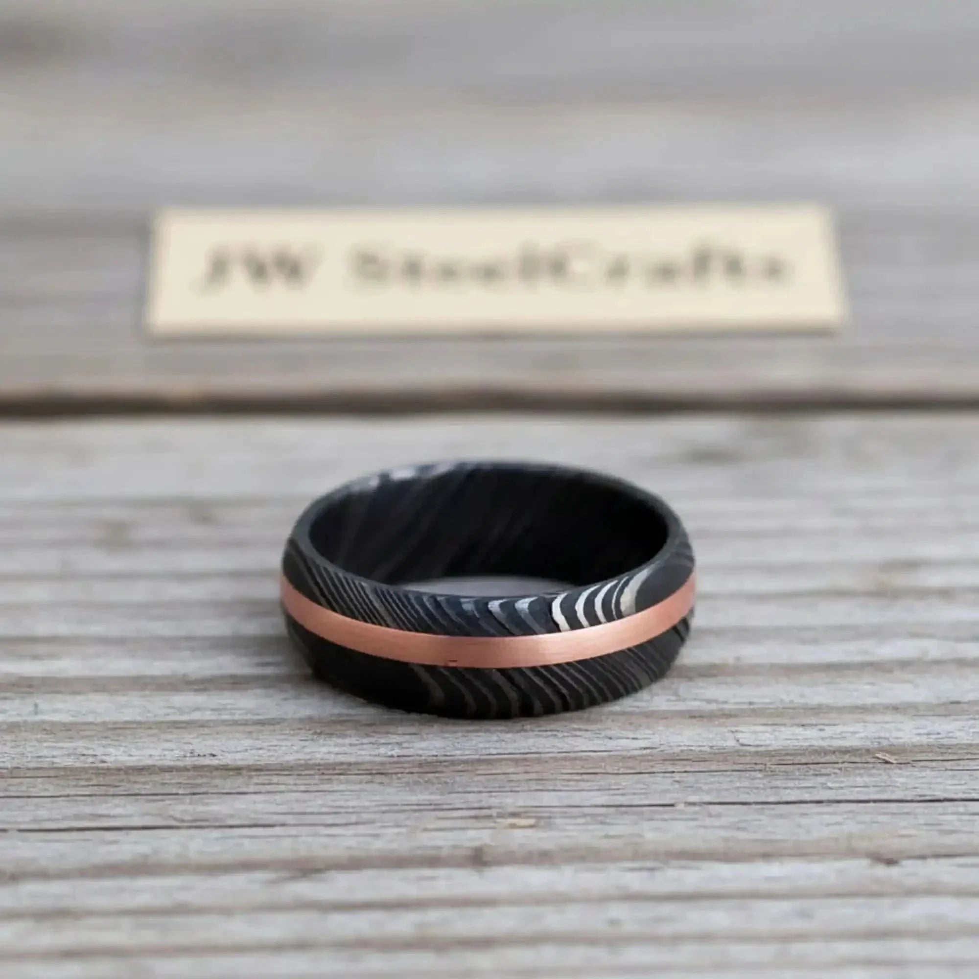 Damascus Offset Copper Inlay Ring with a Domed Dark Band