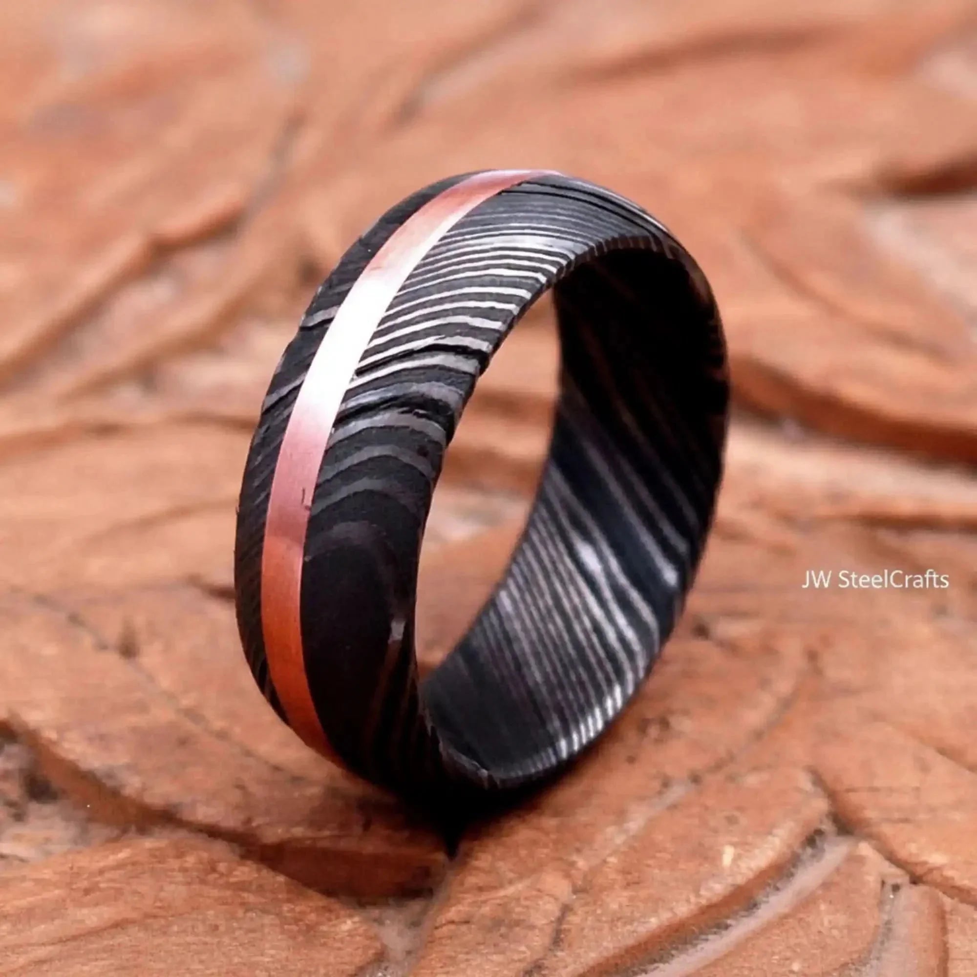 Damascus Offset Copper Inlay Ring with a Domed Dark Band