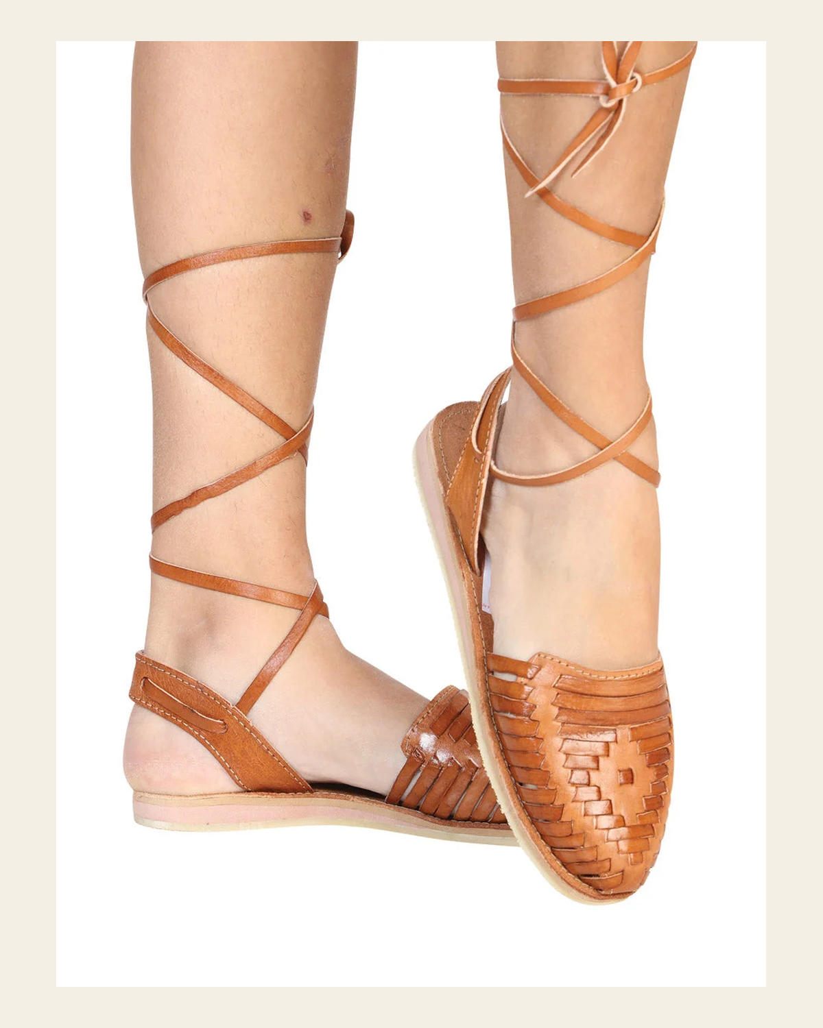 Mexican Artisanal Sandals Leather Natural 602367 on a warm cream background