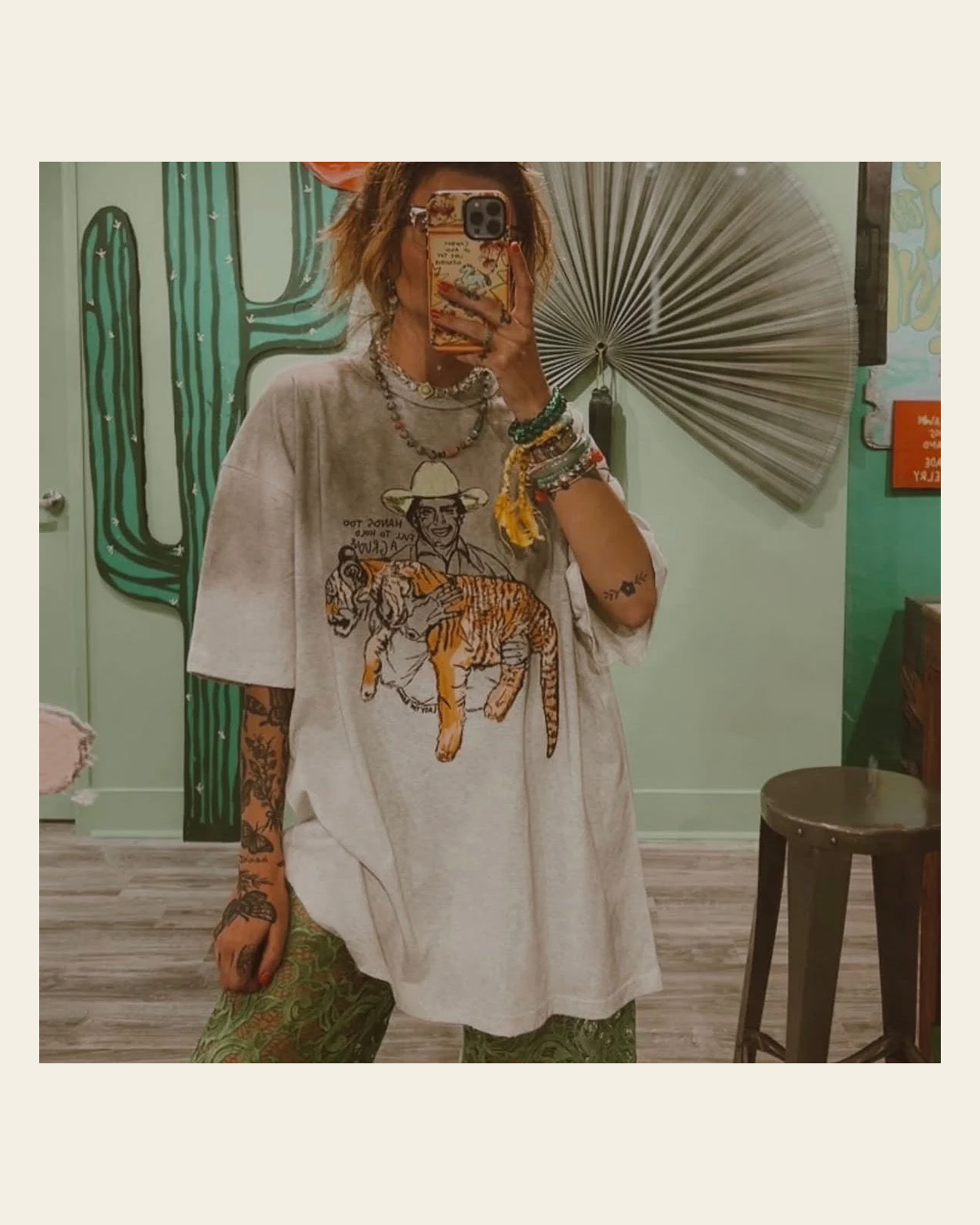 Hands Too Full | Tee on a warm cream background