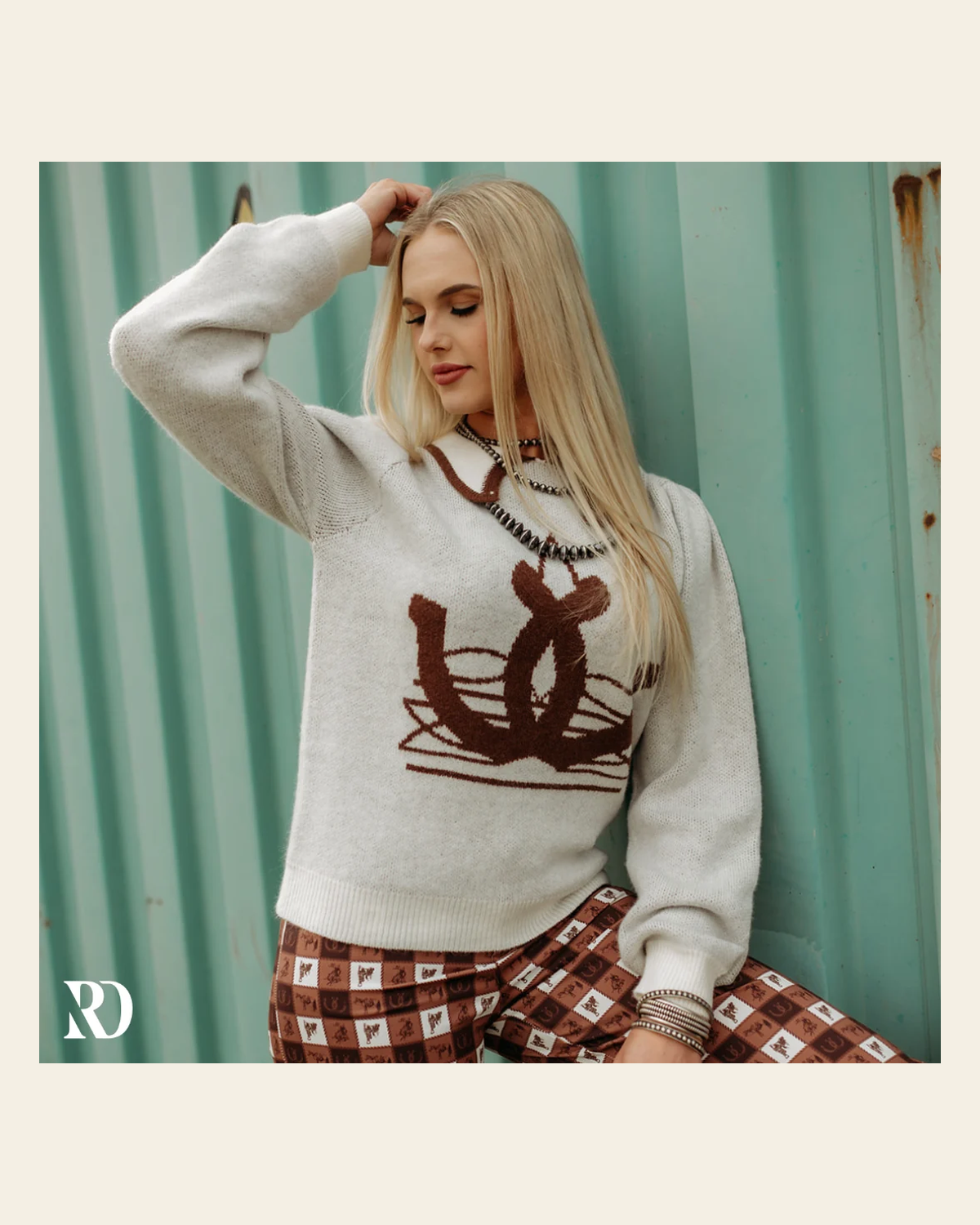 Heritage Horseshoe Collared | Sweater on a warm cream background