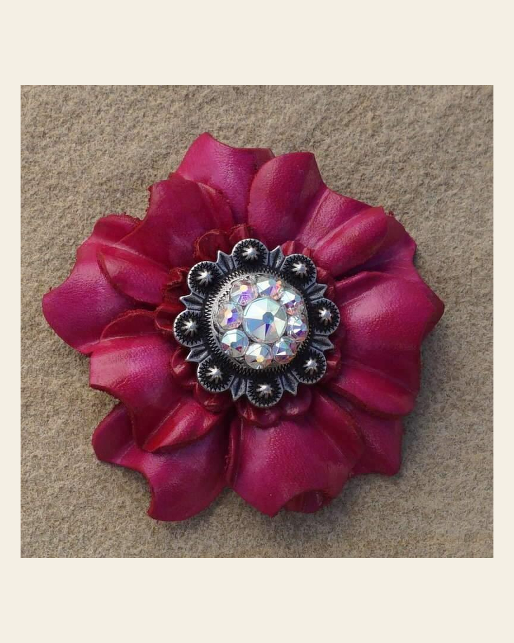 Hot Pink Carnation Flower With Antique Silver AB 1" Concho on a warm cream background