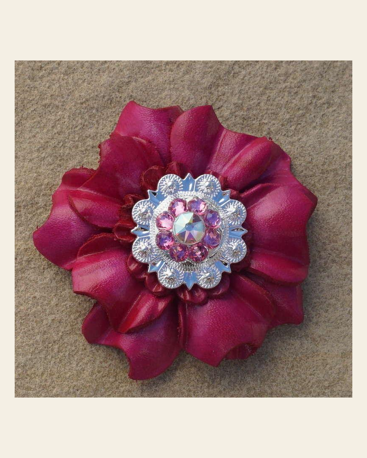 Hot Pink Carnation Flower With Bright Silver Pink and AB 1" Concho on a warm cream background