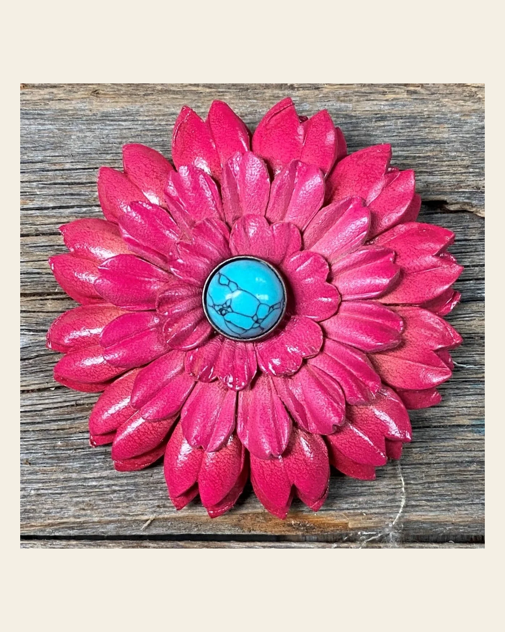 Hot Pink Daisy Flower With Round Turquoise Cabochon on a warm cream background