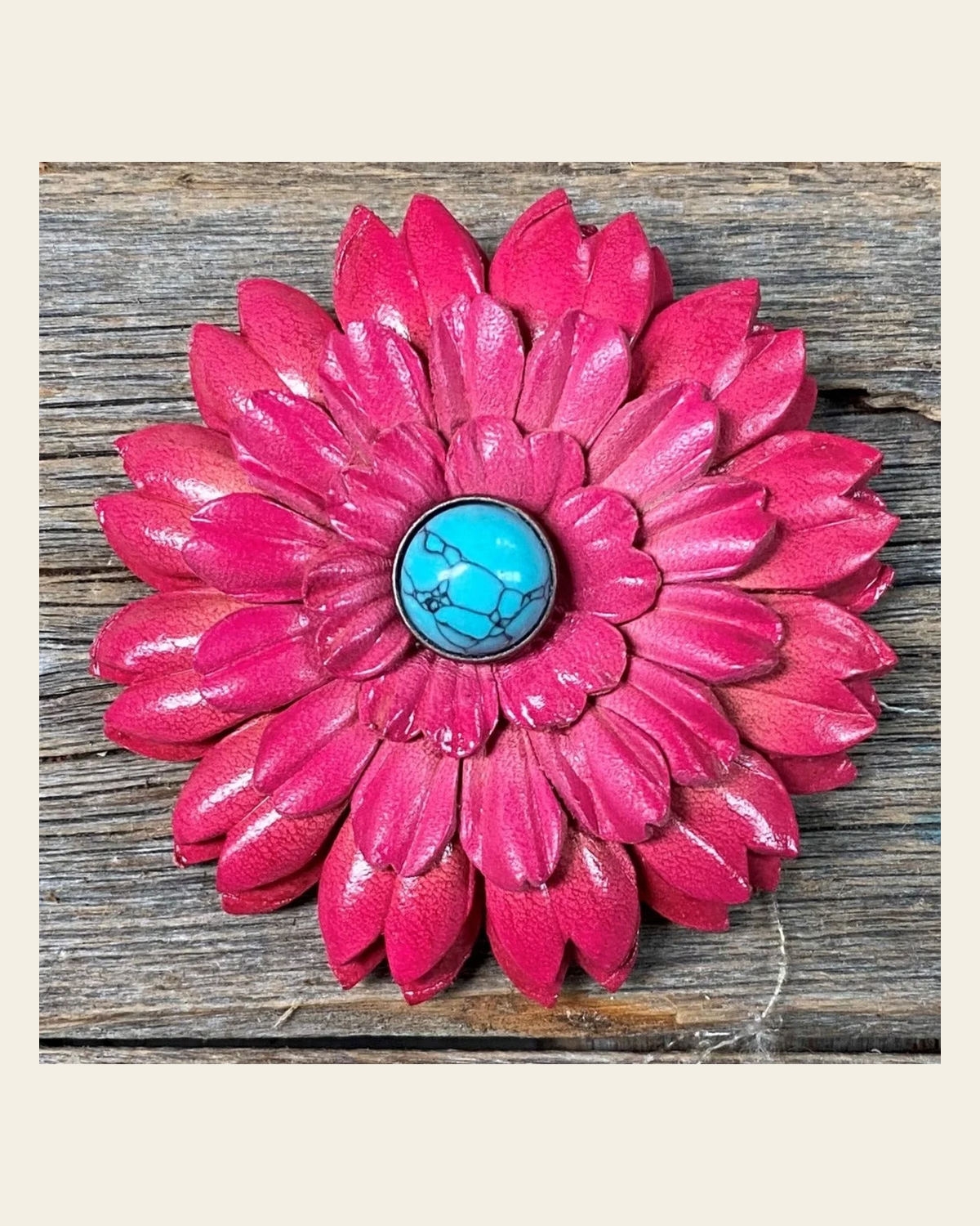 Hot Pink Daisy Flower With Round Turquoise Cabochon on a warm cream background