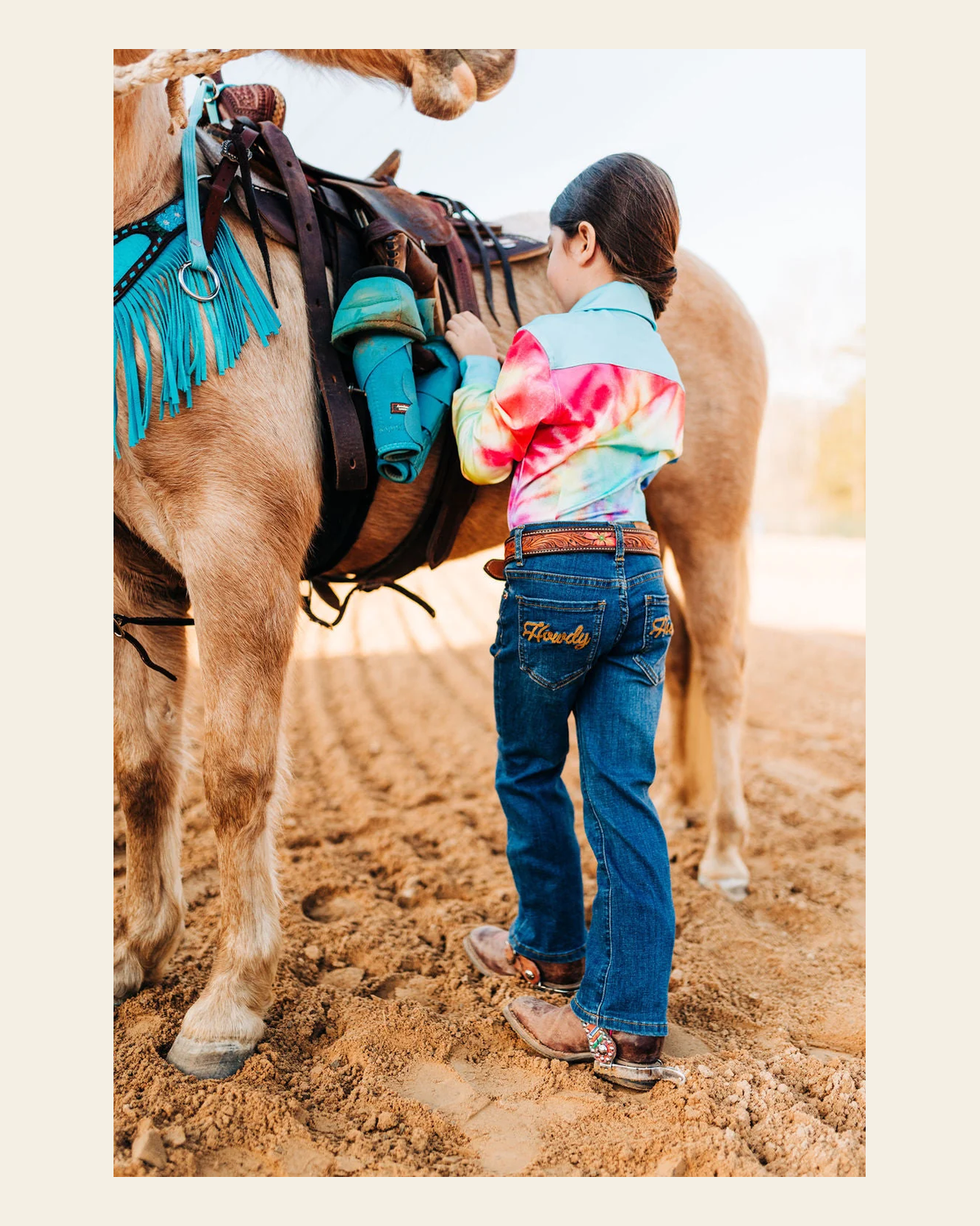 *youth* Howdy Bootcut Denim Jeans on a warm cream background