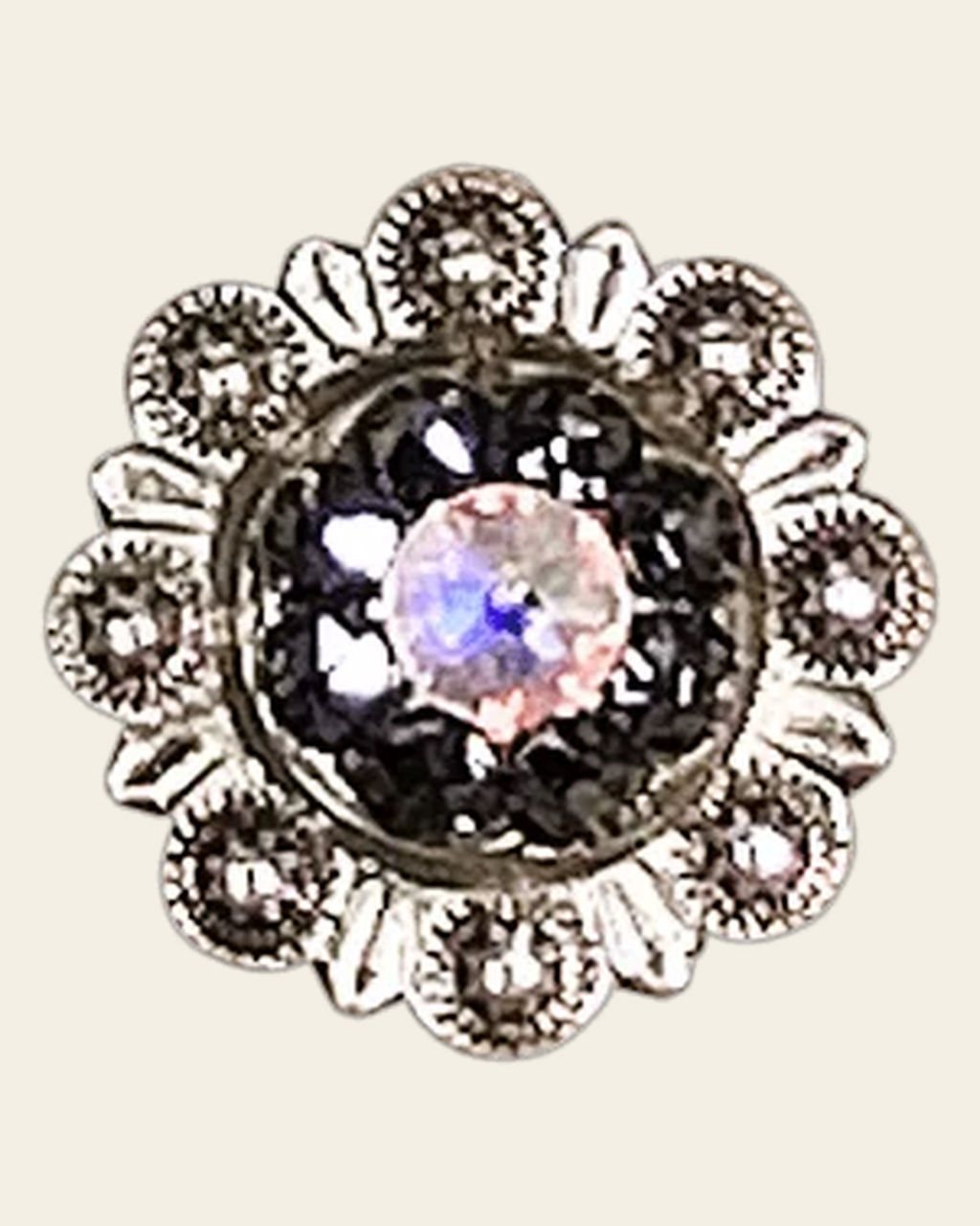 Jet & AB Antique Silver 1" European Crystal Concho on a warm cream background