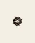 AB & Jet Copper 1" European Crystal Concho on a warm cream background