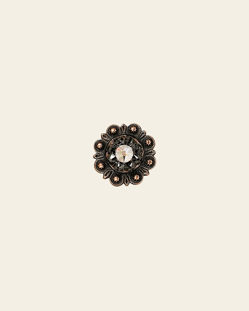 AB & Jet Copper 1" European Crystal Concho on a warm cream background