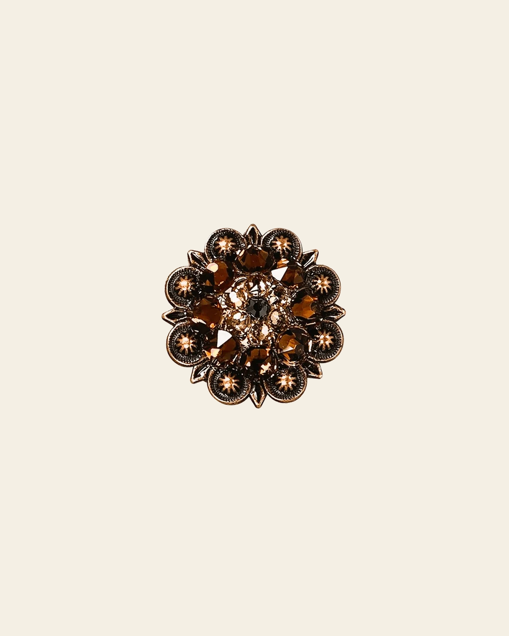 Jet Champagne & Topaz Copper 1.25" European Crystal Concho on a warm cream background