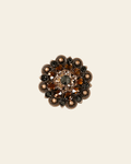 Jet Champagne & Topaz Copper 1.5" European Crystal Concho on a warm cream background