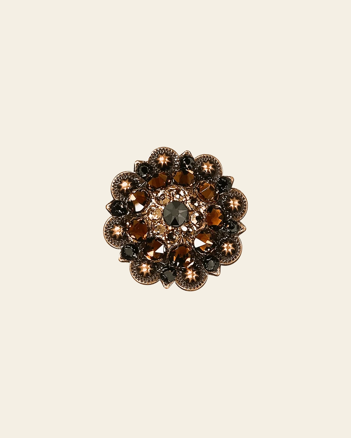 Jet Champagne & Topaz Copper 1.5" European Crystal Concho on a warm cream background