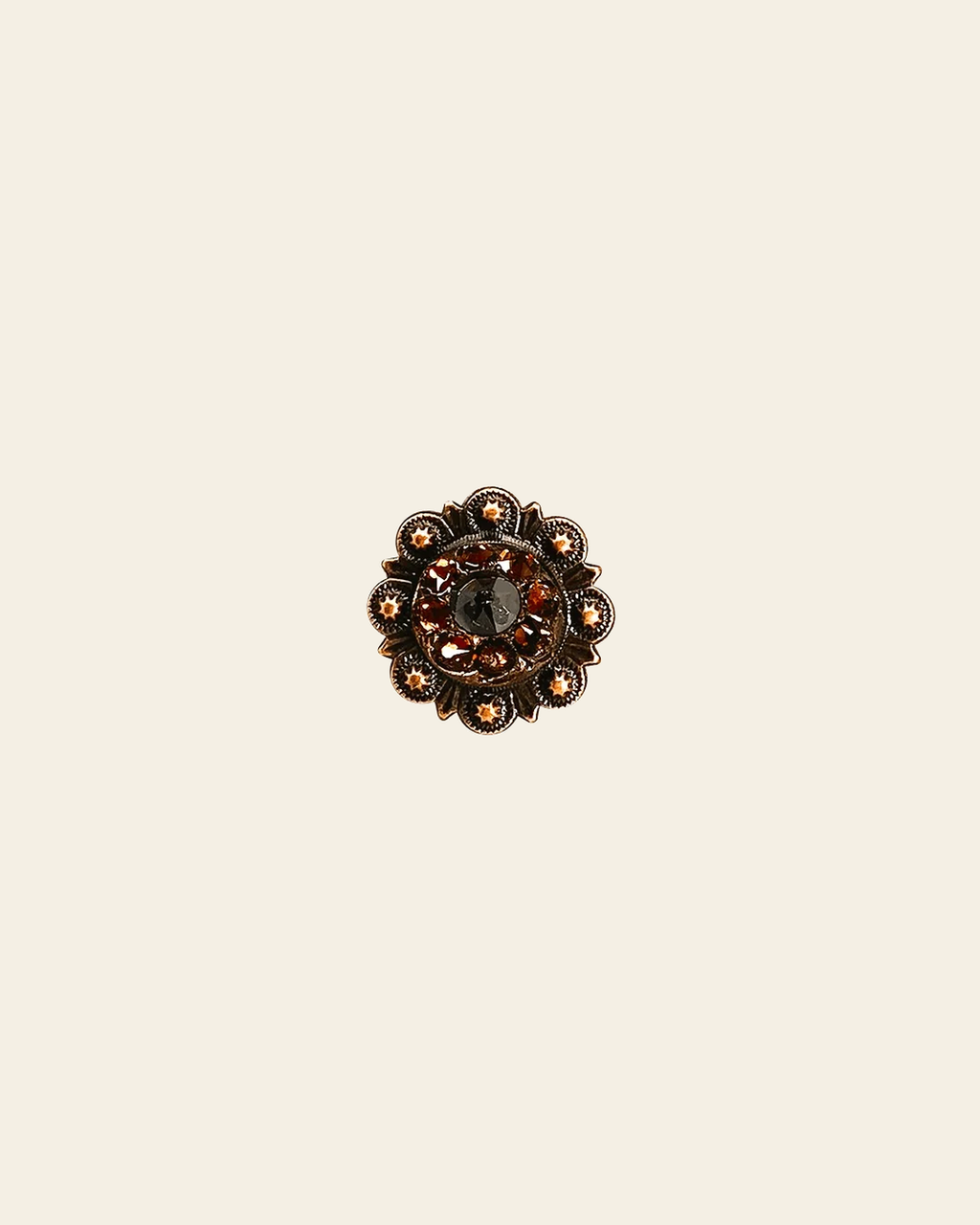 Jet & Topaz Copper 1" European Crystal Concho on a warm cream background