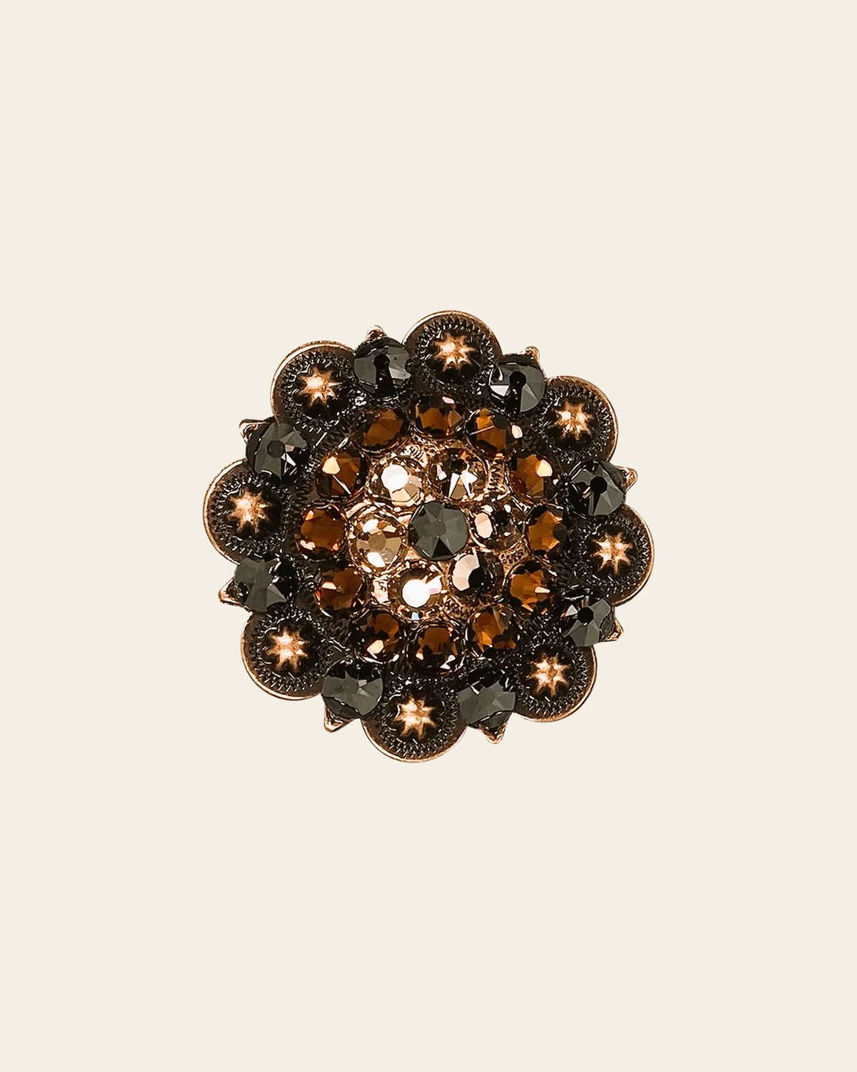 Jet Champagne & Topaz Copper 2" European Crystal Concho on a warm cream background