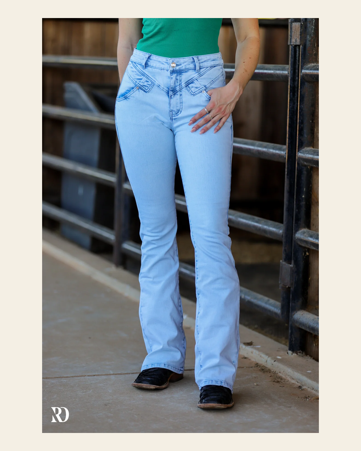 Jolene Bootcut - Light Wash on a warm cream background