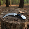 Karambit Knife with Black horn and Stainless steel handle.