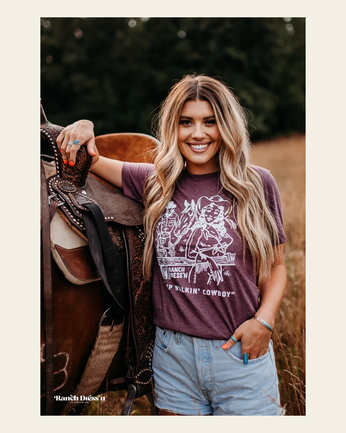 Keep Walkin' Cowboy - Heather Maroon Tee on a warm cream background