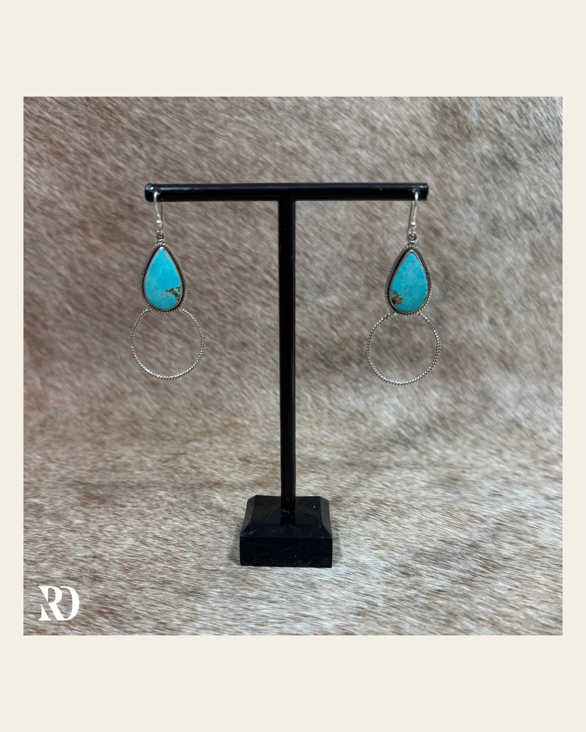 Kingman Turquoise Teardrop Hoop Dangle Earrings - Hada Collection on a warm cream background
