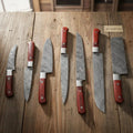7-Piece Kitchen Knife Set with Vegetable Cleaver with Red Pakka Wood Handles and Swirl Damascus Blades