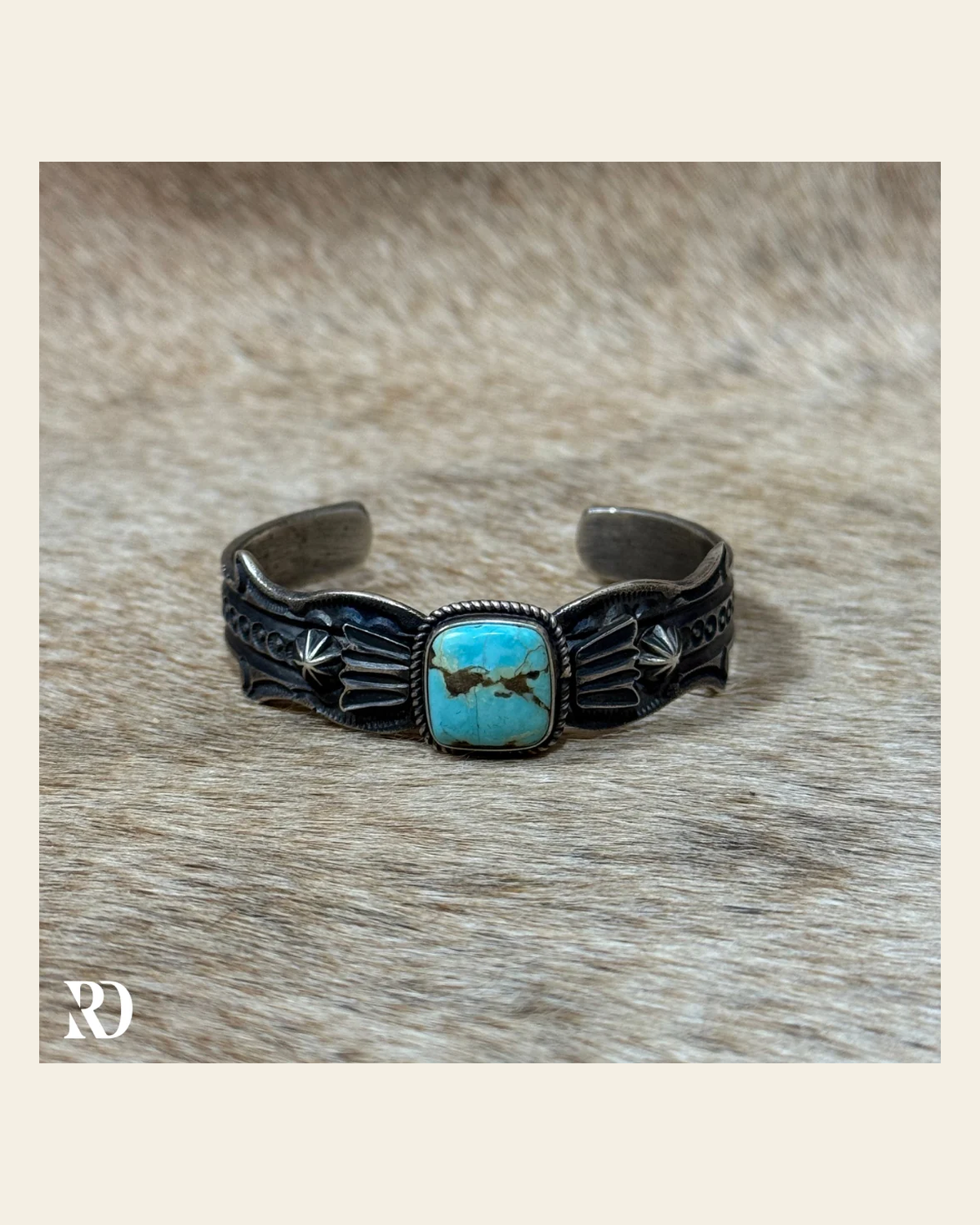 Larimar Cuff By Kevin Billah on a warm cream background