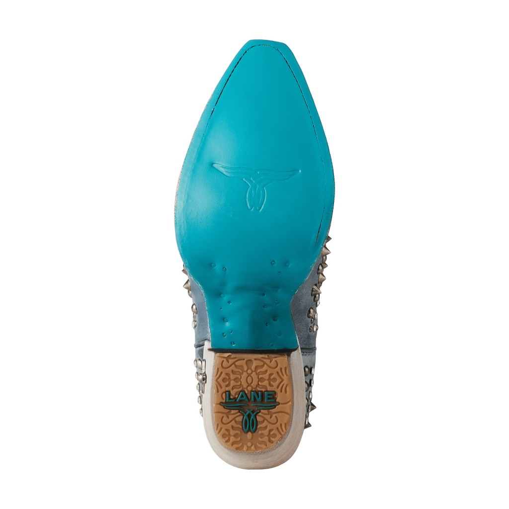 Washed Denim Western-Inspired Boot With Glam Rock Attitude For Modern Wardrobe Capsule