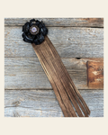 Leather Black Gardenia with Copper Fringe on a warm cream background