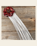 Leather Red Lotus with White Fringe on a warm cream background