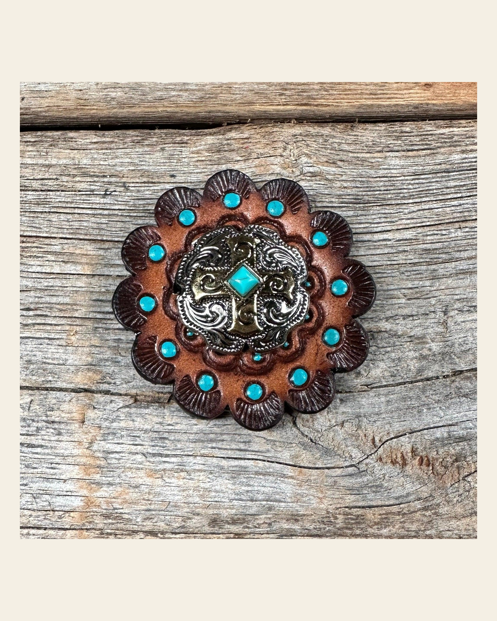 Leather Rosette Dark Oil Edges with Antique Silver and Gold cross Western Concho R112W189S on a warm cream background