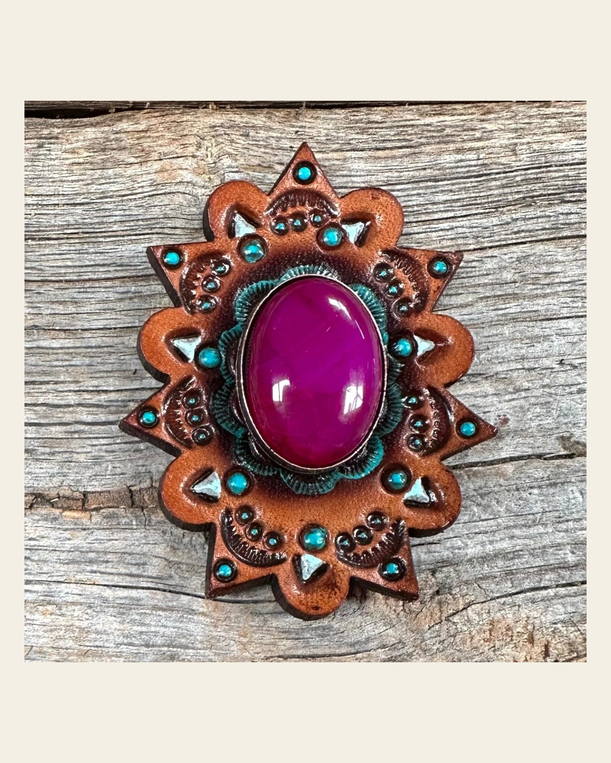 Leather Rosette Starburst - Fuchsia Cabochon Western Concho R110CABFU on a warm cream background