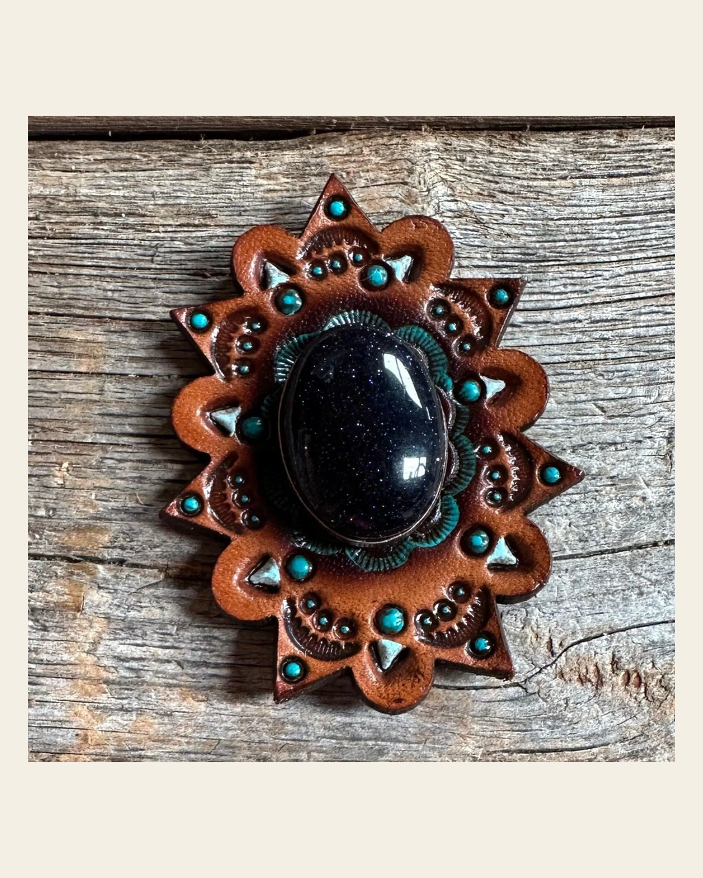 Leather Rosette Starburst - Lapis Cabochon Western Concho R110CABLA on a warm cream background