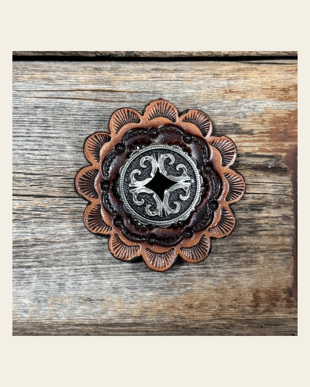 Leather Rosette with Black Diamond Antique Silver Western Concho R111W213S on a warm cream background