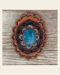 Leather Rosette with Blue Cabochon Western Concho R102CABBL on a warm cream background