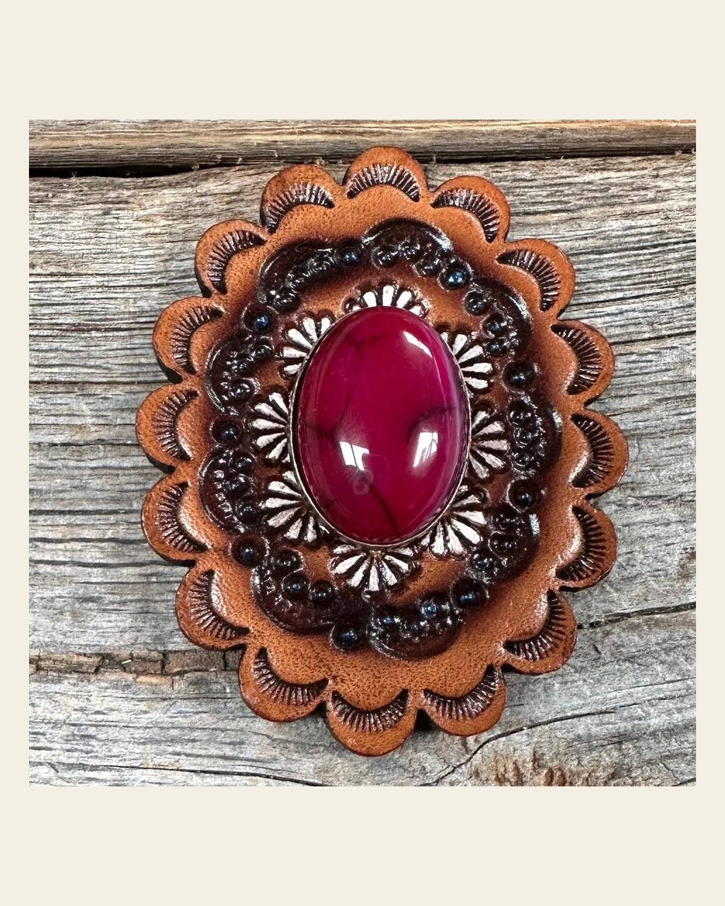 Leather Rosette with Fuchsia Cabochon Western Concho R102CABFU on a warm cream background