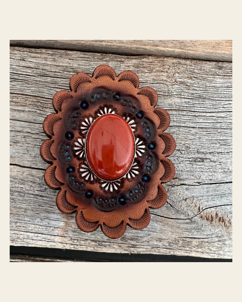 Leather Rosette with Rust Cabochon Western Concho R102CABRU on a warm cream background