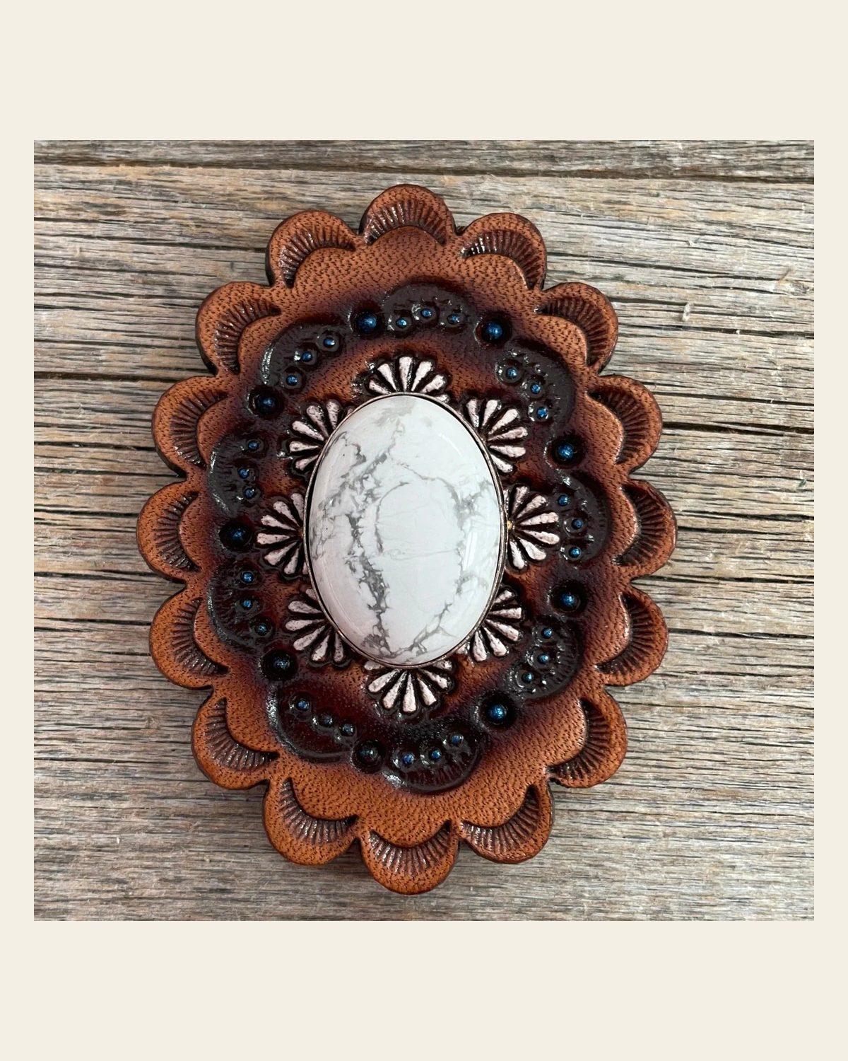Leather Rosette with White Cabochon Western Concho R102CABWT on a warm cream background