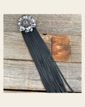 Leather Silver Carnation with Black Fringe on a warm cream background