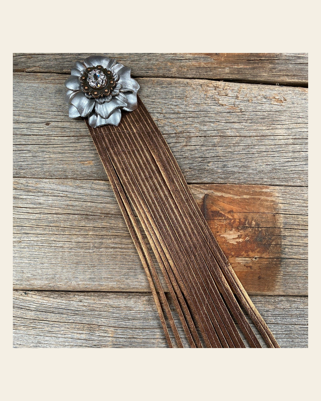 Leather Silver Carnation with Copper Fringe on a warm cream background