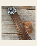 Leather Silver Carnation with Copper Fringe on a warm cream background
